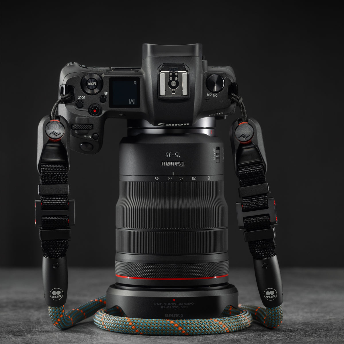 Tuenne camera strap attached to DSLR with Peak Design clips