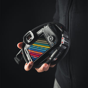 Tuenne camera strap attached to DSLR with Peak Design clips black strap