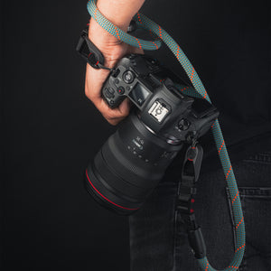 Tuenne camera strap attached to DSLR with Peak Design clips
