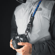 Close-up of modular climbing rope detail on Tuenne camera strap blue