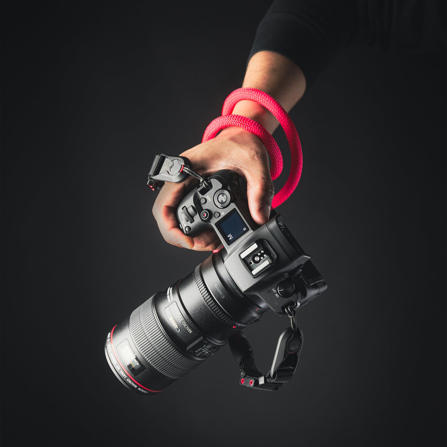 Close-up of modular climbing rope detail on Tuenne camera strap pink