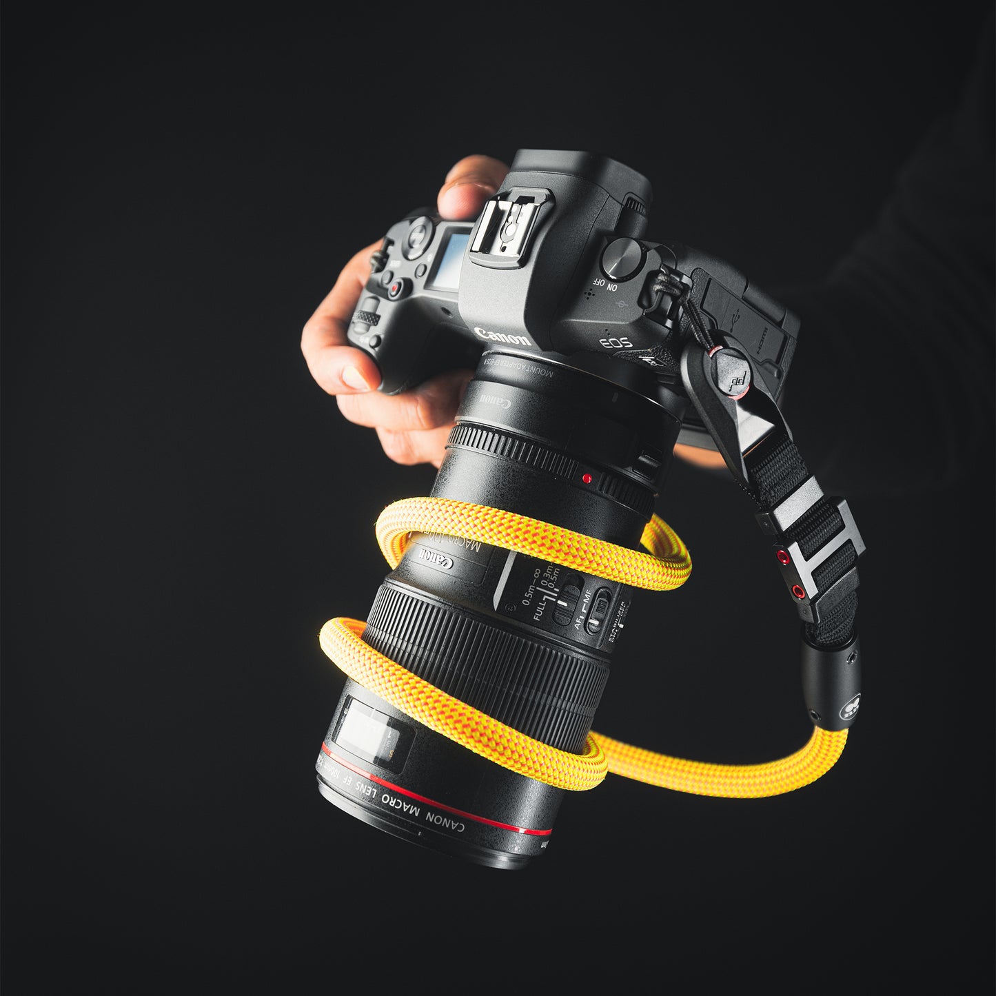 Close-up of modular climbing rope detail on Tuenne camera strap yellow