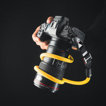 Close-up of modular climbing rope detail on Tuenne camera strap yellow