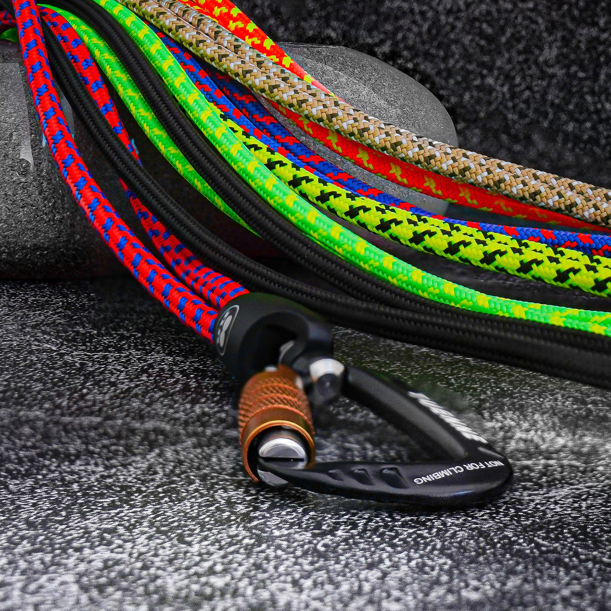 Assorted Tuenne lanyards with close-up of modular carabiner attachment