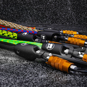 Close-up view of Tuenne rope lanyards showing auto-locking carabiner and modular components