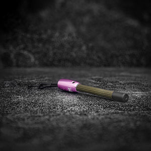 Close-up view of the Yellowstone Rope Keychain showing steel and rope details pink aluminum