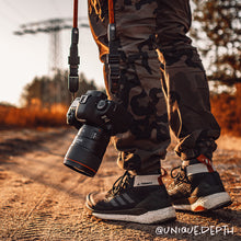 Black climbing rope camera strap compatible with Peak Design by Tuenne on shoot