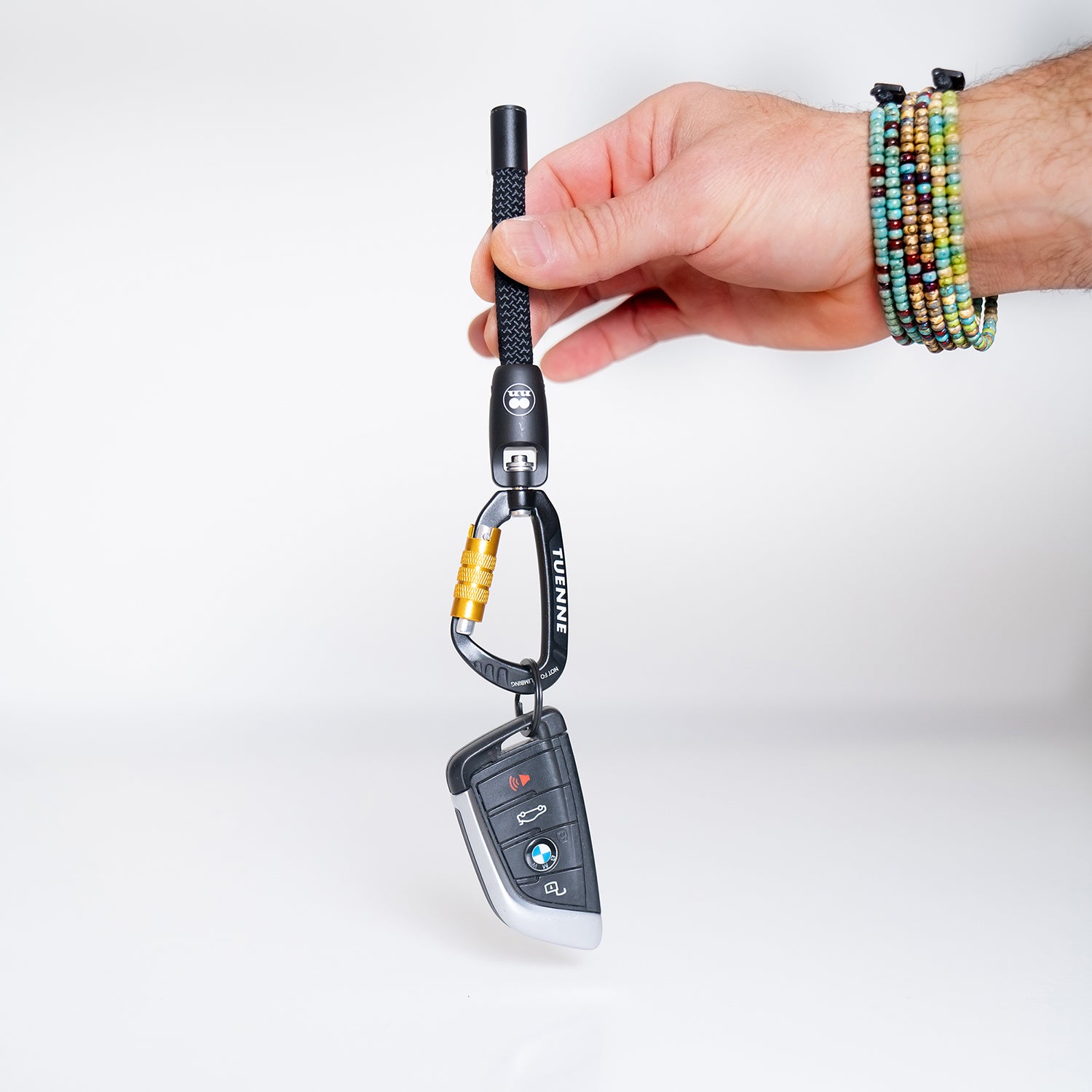 GUNKS Keychain by Tuenne shown in hand – compact climbing rope EDC keychain with secure swivel carabiner