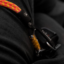Close-up of Tuenne lanyard with carabiner attached to a car key, highlighting secure and durable design